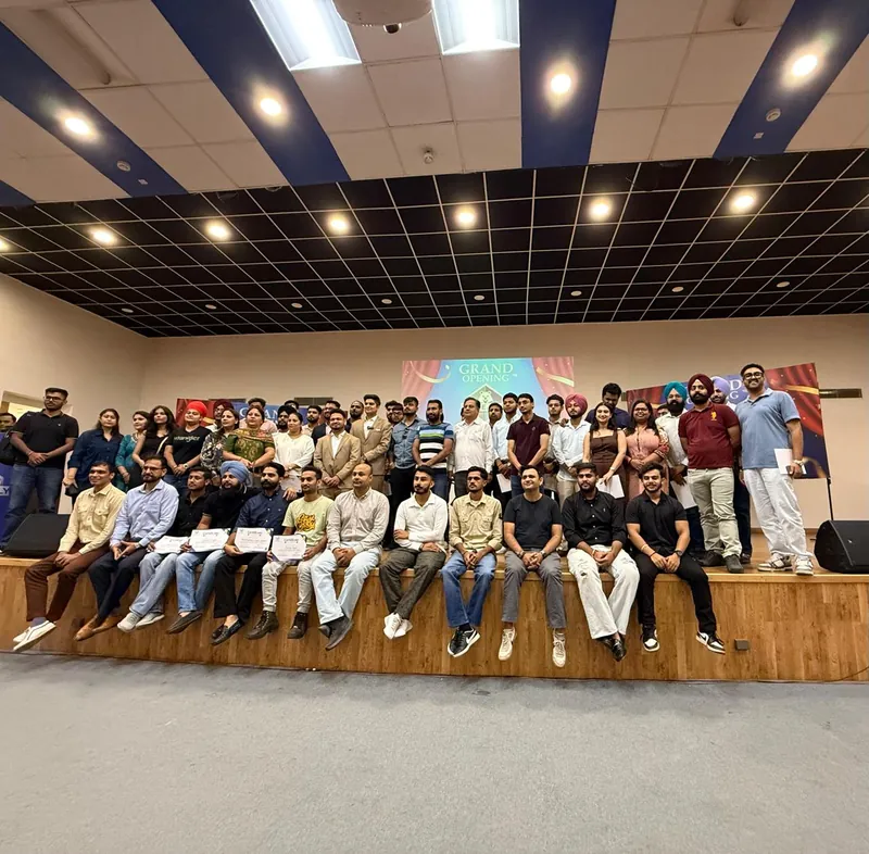 Wise Bucks students, some holding their certificates, at a certificate ceremony in Chandigarh