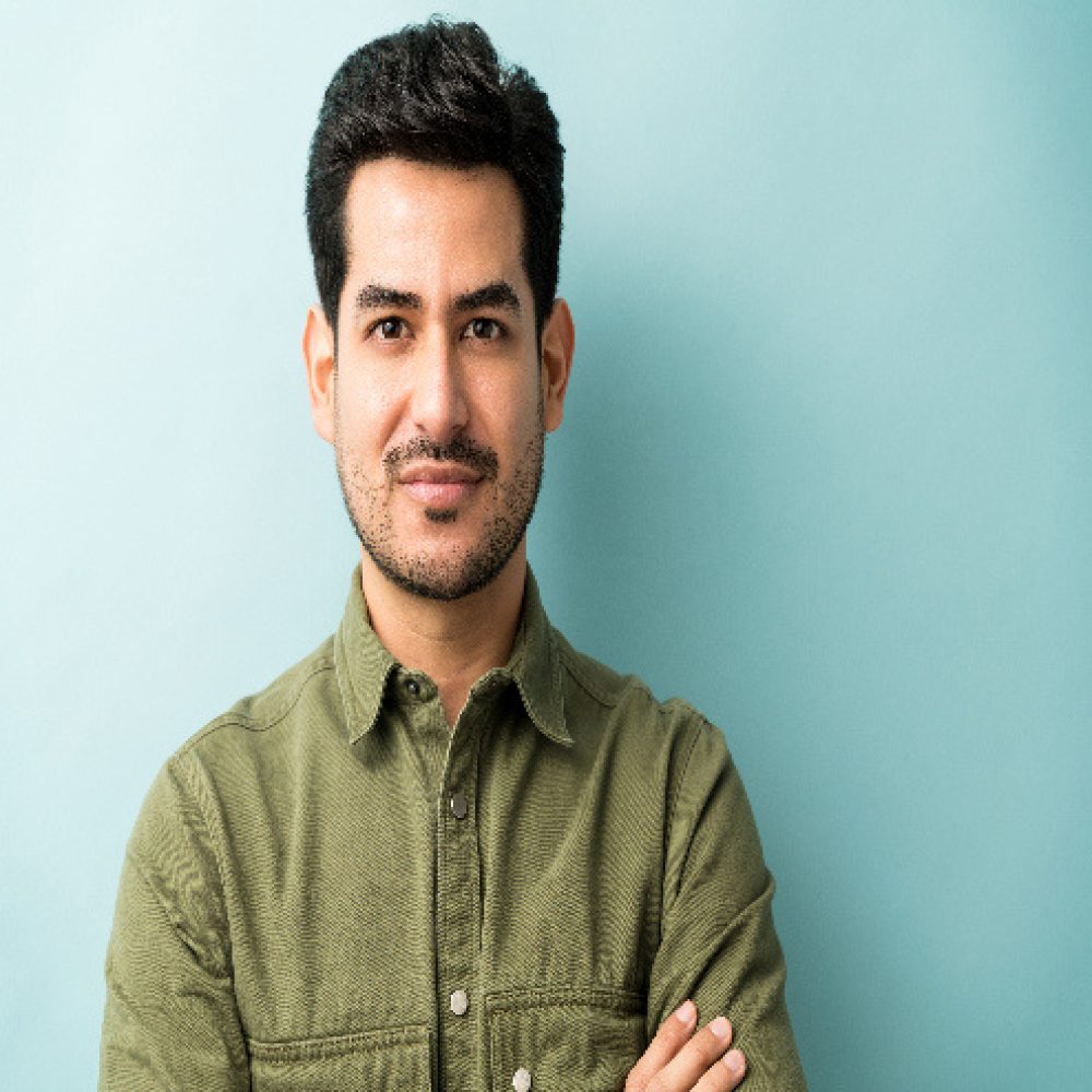 closeup-young-hispanic-man-casuals-studio(1)